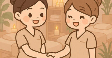 Two spa therapists smiling and collaborating during a treatment, symbolizing the Therapist Swap program concept.