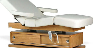 A luxurious facial bed in a spa setting, exemplifying comfort and functionality.