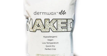Spa professional applying wax during a hair removal treatment