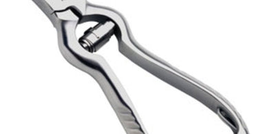 Close-up professional photo of the Mehaz 4.75 inch stainless steel toenail nipper, showing its grooved handles and sharp, curved blades on a clean spa towel.
