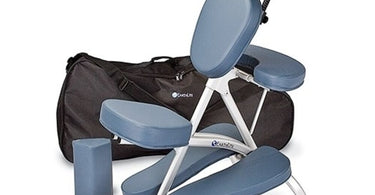 The EarthLite Vortex Portable Massage Chair shown folded and in its carry case, demonstrating its lightweight and compact design for mobile therapists.