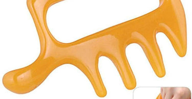 Acupressure Chicken Foot massager tool used during a relaxing spa pedicure treatment