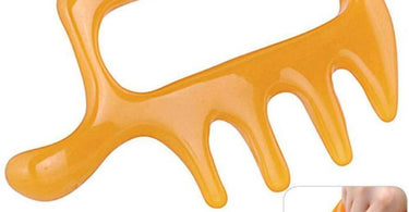 Acupressure Chicken Foot massager tool used during a relaxing spa pedicure treatment
