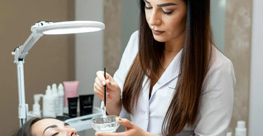 Professional mixing bowl with lash tint and applicator brush