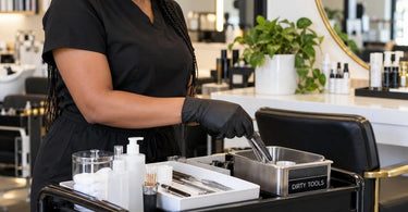 Professional spa service cart with a clearly defined area for used reusable tools awaiting cleaning and disinfection
