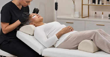 Lash bed with ergonomic neck and knee support pillows for client comfort during lash extension services