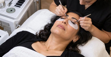 Professional lash client resting comfortably during a long eyelash extension appointment