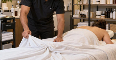 Professional massage table sheets and spa linens illustrating why bedding twists and bunches during long massage therapy sessions