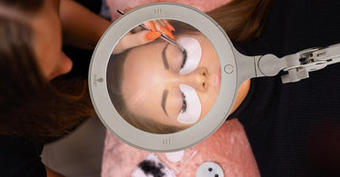 LED magnifying lamp illuminating a spa treatment table