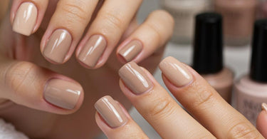 Professional manicure featuring flawless nude nail polish on well-groomed hands
