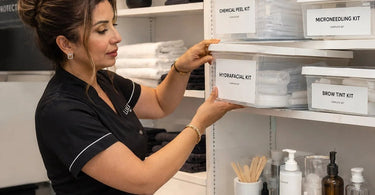 A curated treatment-specific kit displaying all necessary tools and products organized neatly, representing the professional salon setup.