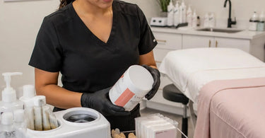 Professional wax warmers and supplies arranged neatly on a salon cart, ready for a midday refill check to ensure continuous client service.