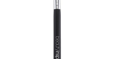 Close-up of the Beauty Inspo Wide Buffer Brush showing its dense, dome-shaped synthetic bristles on a clean background