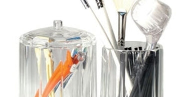 2 Compartment Supply Organizer on a salon counter holding waxing spatulas and pre-wax products for an efficient and tidy workspace.