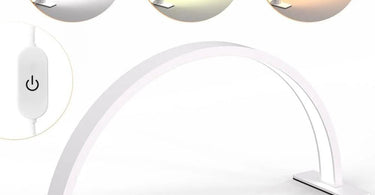 A modern nail desk lamp illuminating a manicure station