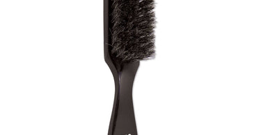 Scalpmaster 8-1/2 inch professional styling brush with natural boar bristles shown on salon station