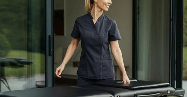 A professional-grade portable massage table setup, showcasing lightweight yet sturdy design for ease of transport and setup.