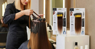 Various types of salon hair extensions displayed on a table