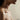 A woman receiving professional decolletage rejuvenation treatment