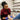 Spa professional preparing a client's feet for a pedicure
