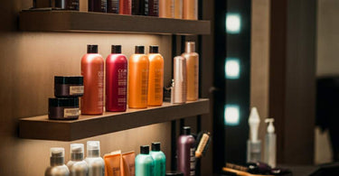 A selection of premium hair care products displayed in a professional salon setting