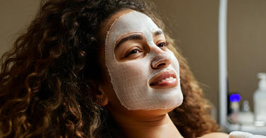 A gauze facial mask being used in a spa facial treatment