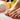 A close-up of freshly pedicured feet with vibrant nail polish