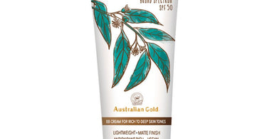 Australian Gold SPF 50 Botanical Tinted Sunscreen BB Cream for Rich to Deep Skin Tones shown on a clean spa towel
