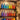 An organized, color-coded spa backbar with bottles featuring different colored labels and tools sorted by color in bins
