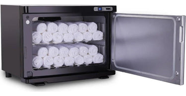 Warm towels in a spa setting, emphasizing client comfort and luxury