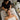 Woman receiving a relaxing scalp massage with essential oils during a body treatment at a spa, highlighting the new service touchpoint.
