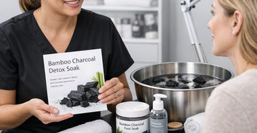 A relaxing professional pedicure detox soak using bamboo charcoal in a spa pedicure chair to cleanse and soothe tired feet.