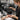 Close up of a clean charcoal filter being held by a salon professional, symbolizing fresh air and purified environment in a beauty workspace.