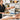 Therapy grade magnesium oil being applied during a professional massage treatment on a Pure Spa Direct portable massage table.