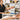 Therapy grade magnesium oil being applied during a professional massage treatment on a Pure Spa Direct portable massage table.