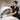 Professional grade steam canopy set up on a massage table in a modern spa treatment room