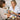 Close up of a professional nail technician applying carnauba wax buffer to a client's fingernail for a high gloss shine finish at a salon spa.
