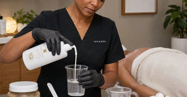 A set of clear plastic measuring cups with measurement markings used for precise mixing in spa body treatments.
