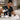 A set of clear plastic measuring cups with measurement markings used for precise mixing in spa body treatments.