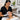 A professional performing a deep pore cleansing facial treatment on a client using an Ultrasonic Skin Scraper spatula.