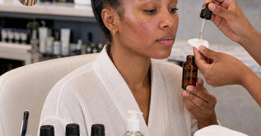 Collection of essential oils including lavender and chamomile for reducing post-treatment skin redness in spa settings