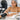 Best Methods For Cleaning Clogged Spray Tan Residue Near Nail Stations - Professional salon cleaning supplies and spray tan residue remover on a white manicure station.