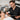 Professional esthetician applying hard wax to a client's brow area, illustrating safe waxing practices for clients using prescription acne medications.
