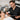 Professional esthetician applying hard wax to a client's brow area, illustrating safe waxing practices for clients using prescription acne medications.