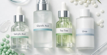 Illustrative icons representing four key waxing retail ingredients: salicylic acid, glycolic acid, tea tree, and urea, on a soft pink background for a blog post on Pure Spa Direct.