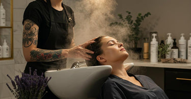 Relaxing salon atmosphere with soft lighting, plush seating, and a client enjoying a pampering treatment