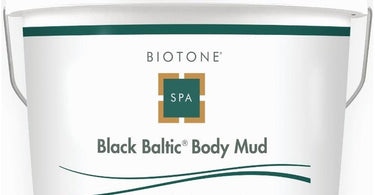 Spa mud in a large container, ready for professional use in body and facial treatments