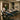 Spa professional administering IV therapy to a relaxed client