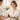 A serene spa setup for bridal skincare featuring luxurious towels, facial products, and a glowing ring, symbolizing pre-wedding beauty preparation.