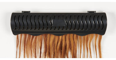 Celebrity Hair Extensions Holder keeping weft extensions organized on a salon workstation